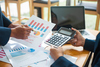 Is AGNC Investment Stock a Buy Now?: https://g.foolcdn.com/editorial/images/852925/22_04_25-two-people-comparing-charts-with-a-calculator-and-computer-on-a-table-_gettyimages-1212963371.jpg