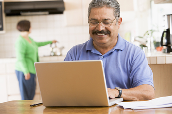 This 2026 401(k) Change Offers Savers a Huge Hidden Benefit: https://g.foolcdn.com/editorial/images/852875/man-50s-laptop-gettyimages-120621802.jpg