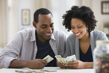 The Smartest Dividend Stock to Buy With $10,000 Right Now: https://g.foolcdn.com/editorial/images/853890/couple-counts-money.jpg