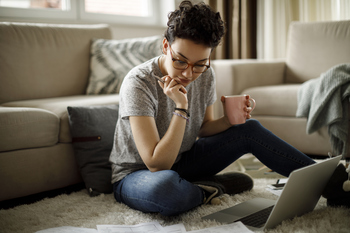 There's a New Exception to the 401(k) Early Withdrawal Penalty. Should You Use It?: https://g.foolcdn.com/editorial/images/853241/person-sitting-on-floor-looking-at-documents.jpg