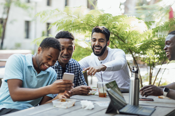 Will Cuts to the Metaverse Help Meta Platforms Stock Soar in 2026?: https://g.foolcdn.com/editorial/images/852761/people-laughing-at-a-meme-on-someones-phone.jpg