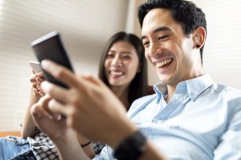 This Artificial Intelligence (AI) Stock Could Turn $1,000 Into $87,000 -- and Much More: https://g.foolcdn.com/editorial/images/850973/getty-couple-smiling-at-phone-happy-success.jpg