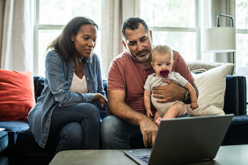 1 Major Reason to Open a Roth IRA in 2026: https://g.foolcdn.com/editorial/images/853244/two-people-looking-at-laptop-while-one-holds-baby.jpg