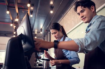 Overlooked and Undervalued: Why Fiserv Deserves Attention: https://g.foolcdn.com/editorial/images/853035/two-people-working-in-a-restaurant.jpg