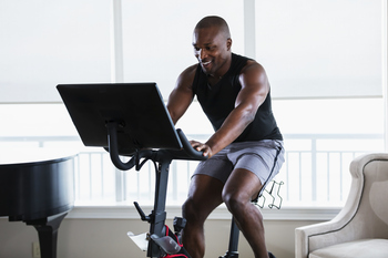 If You'd Invested $1,000 in Peloton Interactive Stock (PTON) 5 Years Ago, Here's How Much You'd Have Today (Spoiler: Yikes!): https://g.foolcdn.com/editorial/images/850989/getty-bike-exercise-man-on-peloton-image-source_-getty.jpg