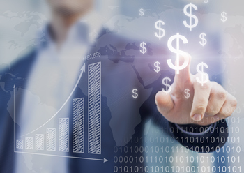 Why I Just Can't Stop Buying This 5.3%-Yielding Passive Income Powerhouse: https://g.foolcdn.com/editorial/images/853446/a-person-pointing-to-dollar-signs-next-to-a-chart-showing-steady-growth.jpg