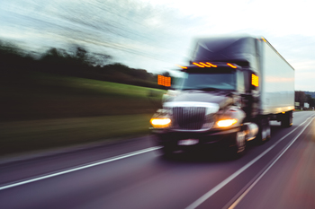 Could This Beaten-Down AI Stock Stage the Comeback of 2026?: https://g.foolcdn.com/editorial/images/852206/truck-moving-fast-on-road.jpg