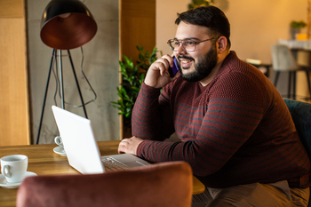 Is CoreWeave a Buy After This Big News From Nvidia?: https://g.foolcdn.com/editorial/images/853654/gettyimages-man-smiles-on-phone-at-computer.jpg
