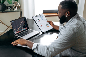 Should You Invest $1,000 in Broadcom Right Now?: https://g.foolcdn.com/editorial/images/853458/person-looking-at-a-computer-with-a-stock-price-graph-on-it.jpg
