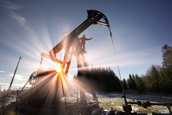 This $58 Billion Merger is Creating a New U.S. Oil and Gas Giant: https://g.foolcdn.com/editorial/images/854187/a-person-standing-on-an-oil-well-with-the-sun-shining-in-the-background.jpg