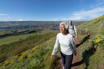 Retired and Moving in 2026? How This Could Affect Your Social Security and Medicare Benefits: https://g.foolcdn.com/editorial/images/854024/couple-going-for-a-hike.jpg