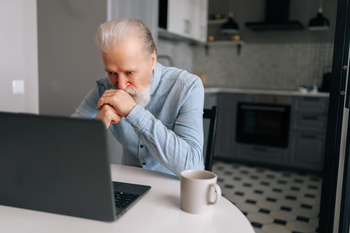 Nearing Retirement? 4 Ways to Catch Up on Savings if You're Behind.: https://g.foolcdn.com/editorial/images/853424/older-man-laptop-kitchen-looks-frustrated-gettyimages-1544246983.jpg