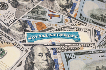 Here's Exactly Who Qualifies for the Maximum Social Security Benefit in 2026: https://g.foolcdn.com/editorial/images/854297/gettyimages-social-security-card-covered-in-100s.jpg