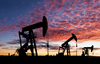 Why Chevron Stock Surged Over 16% in January: https://g.foolcdn.com/editorial/images/854481/oil-pumps-with-the-sun-setting-in-the-background.jpg