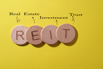 One High-Yield Dividend Stock You Can Buy and Hold for a Decade of Income: https://g.foolcdn.com/editorial/images/850455/reit-coins-explaination.jpg