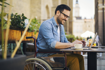 This AI Giant May Advance 46%, According to Wall Street. And Right Now, It's Dirt Cheap.: https://g.foolcdn.com/editorial/images/854487/happy-wheelchair-person-working.jpg