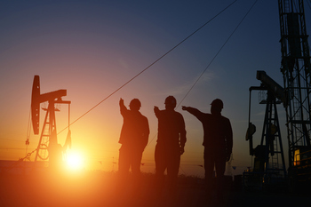 1 Top Oil Stock to Buy and Hold Through the End of the Decade: https://g.foolcdn.com/editorial/images/854673/people-near-an-oil-well-with-the-sun-rising-in-the-background.jpg