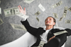 Is Sandisk the Next Micron?: https://g.foolcdn.com/editorial/images/854431/man-sitting-flying-currency-notes.jpg