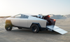 Buying Tesla Stock Taught Me a Costly Lesson: https://g.foolcdn.com/editorial/images/858694/tesla-cybertruck-with-cyberquad-atv-in-truck-bed.png