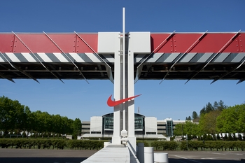 Should You Buy Nike Stock Before March 31?: https://g.foolcdn.com/editorial/images/860766/nike-logo-in-front-of-a-building.jpg