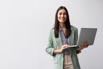 2 Artificial Intelligence (AI) Networking Stocks With the Highest Upside in 2026: https://g.foolcdn.com/editorial/images/859664/professional_smiling_while_holding_a_laptop.jpg