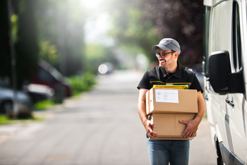 1 Magnificent Industrial Stock Down 58% to Buy and Hold Forever: https://g.foolcdn.com/editorial/images/858830/package-delivery-amazon-driver-ups.jpg