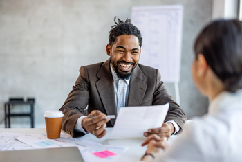 Wall Street Is Wrong About This AI Cloud Stock for 2026: https://g.foolcdn.com/editorial/images/860335/businessperson-laughing-while-talking-to-a-colleague.jpg