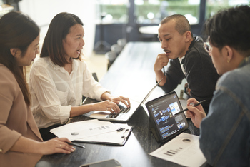Is Figma a Buy?: https://g.foolcdn.com/editorial/images/860703/coworkers-in-a-meeting.jpg