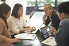 Is Figma a Buy?: https://g.foolcdn.com/editorial/images/860703/coworkers-in-a-meeting.jpg