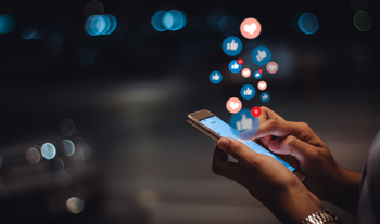 1 Artificial Intelligence (AI) Stock You Could Hold Forever: https://g.foolcdn.com/editorial/images/859632/person-interacting-with-social-media-posts.jpg