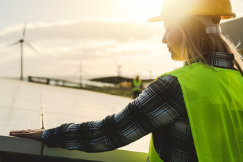 The Best 3 Renewable Energy Stocks to Buy and Hold for Decades: https://g.foolcdn.com/editorial/images/858759/a-person-installing-a-solar-panel-near-a-wind-farm.jpg