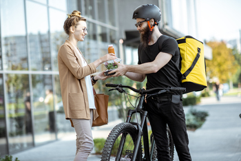 Uber Is Quietly Expanding Into a Multitrillion-Dollar Market: https://g.foolcdn.com/editorial/images/861209/food-delivery-bike-messenger-uber-eats-grubhub.jpg