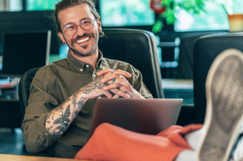 Here's How Many Shares of AbbVie (ABBV) Stock You'd Need for $10,000 in Yearly Dividends: https://g.foolcdn.com/editorial/images/860153/getty-happy-feet-on-desk-smiling-tattoos.jpg