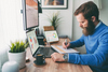 Is Alphabet Stock Still a Buy?: https://g.foolcdn.com/editorial/images/863224/bearded-person-at-desk-by-computer-taking-notes.jpg