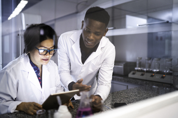 1 Reason This Biotech Stock Could Triple Before Year-End: https://g.foolcdn.com/editorial/images/862259/biotech-pharma-researchers-talk-lab.jpg