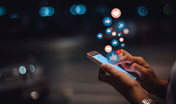Can Meta Platforms Get to a $9 Trillion Valuation by 2031?: https://g.foolcdn.com/editorial/images/862747/a-person-using-social-media-on-their-phone.jpg