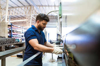 Wall Street Overlooked This Industrial Stock. Down 14%, It's Now a Forever Buy.: https://g.foolcdn.com/editorial/images/863024/factory-worker-at-machine.jpg