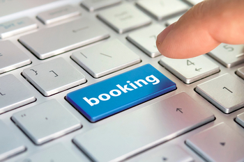 Global Travel Concerns Are Driving Down Bookings Holdings' Stock. Is the Travel Giant Still a Good Long-Term Buy?: https://g.foolcdn.com/editorial/images/863429/travel-booking.jpg