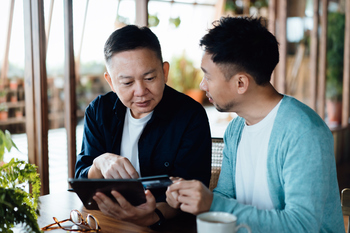 Is Solana the Best Crypto to Buy Now With $500?: https://g.foolcdn.com/editorial/images/862570/one-investor-explains-something-to-another-at-a-cafe.jpg