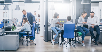 Could AI Really Kill Atlassian's Business? Here's Why Wall Street Might Be Wrong: https://g.foolcdn.com/editorial/images/863483/an-office-with-six-people-in-it-working-together-in-pairs.jpg