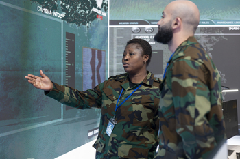 Better Defense Stock: Lockheed Martin vs. RTX: https://g.foolcdn.com/editorial/images/863098/military-personnel-look-at-digital-display-getty.jpg