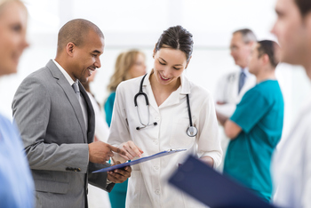 Should You Buy AbbVie Stock Before April 29?: https://g.foolcdn.com/editorial/images/864070/a-doctor-looking-at-a-tablet-with-another-person.jpg