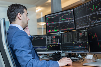Billionaires Are Loading Up on This Genius Stock That's Up by More Than 212,600% Since Its IPO: https://g.foolcdn.com/editorial/images/863339/person-in-front-of-multiple-computer-screens-looking-at-stock-graphs.jpg