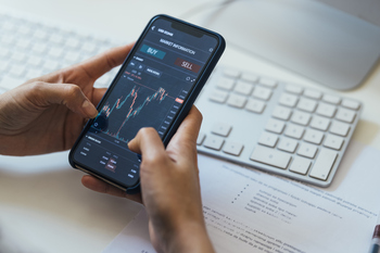 Should Investors Buy Amazon Stock Instead of Walmart Stock?: https://g.foolcdn.com/editorial/images/864683/stock-market-graph-on-smartphone.jpg