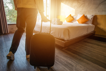 Should You Buy the Dip on Booking Holdings Stock in April?: https://g.foolcdn.com/editorial/images/863427/travel-checking-in-room.jpg