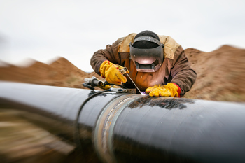 Don't Get Caught Up in the Oil Rally: This High-Yield Stock Will Keep Paying Long After the Rally Ends: https://g.foolcdn.com/editorial/images/864465/22_06_14-a-person-in-protective-gear-welding-an-energy-pipeline-_gettyimages-1130949180.jpg
