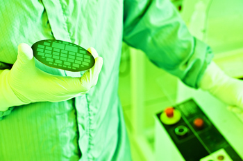 Don't Panic Over UPS: These 2 Mega-Cap Stocks Are the Real Opportunity: https://g.foolcdn.com/editorial/images/863026/scientist-lab-technician-holding-wafer.jpg