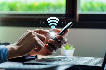 Should You Buy Verizon Communications Stock Before April 27?: https://g.foolcdn.com/editorial/images/865235/a-person-using-internet-on-their-phone.jpg