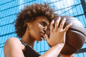 Prediction: Women's Sports Won't Save Nike Stock: https://g.foolcdn.com/editorial/images/864750/athletic_sports_woman-with-basketball-1201x801-d21b45d.jpg