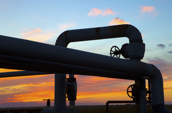 3 Contract‑Rich Energy Stocks With the Backlogs to Outlast Today's Iran Conflict: https://g.foolcdn.com/editorial/images/865615/a-looping-pipeline-with-the-sun-setting-in-the-background.jpg